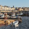 Portstewart fishing boat harbour and main street seafront, County Londonderry